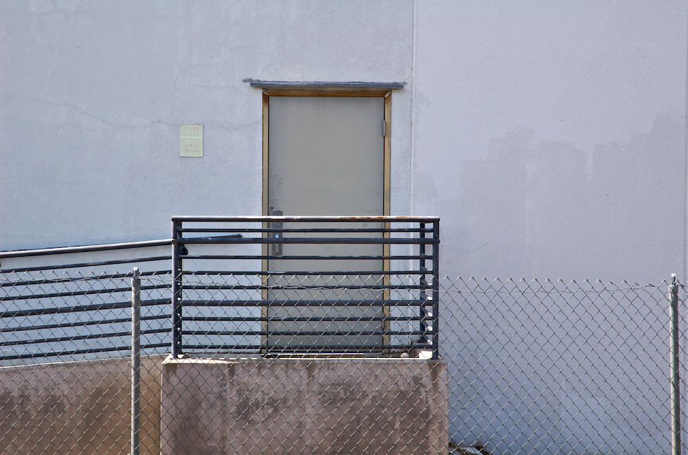 Door behind fence