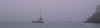 Fishing boat in the mist